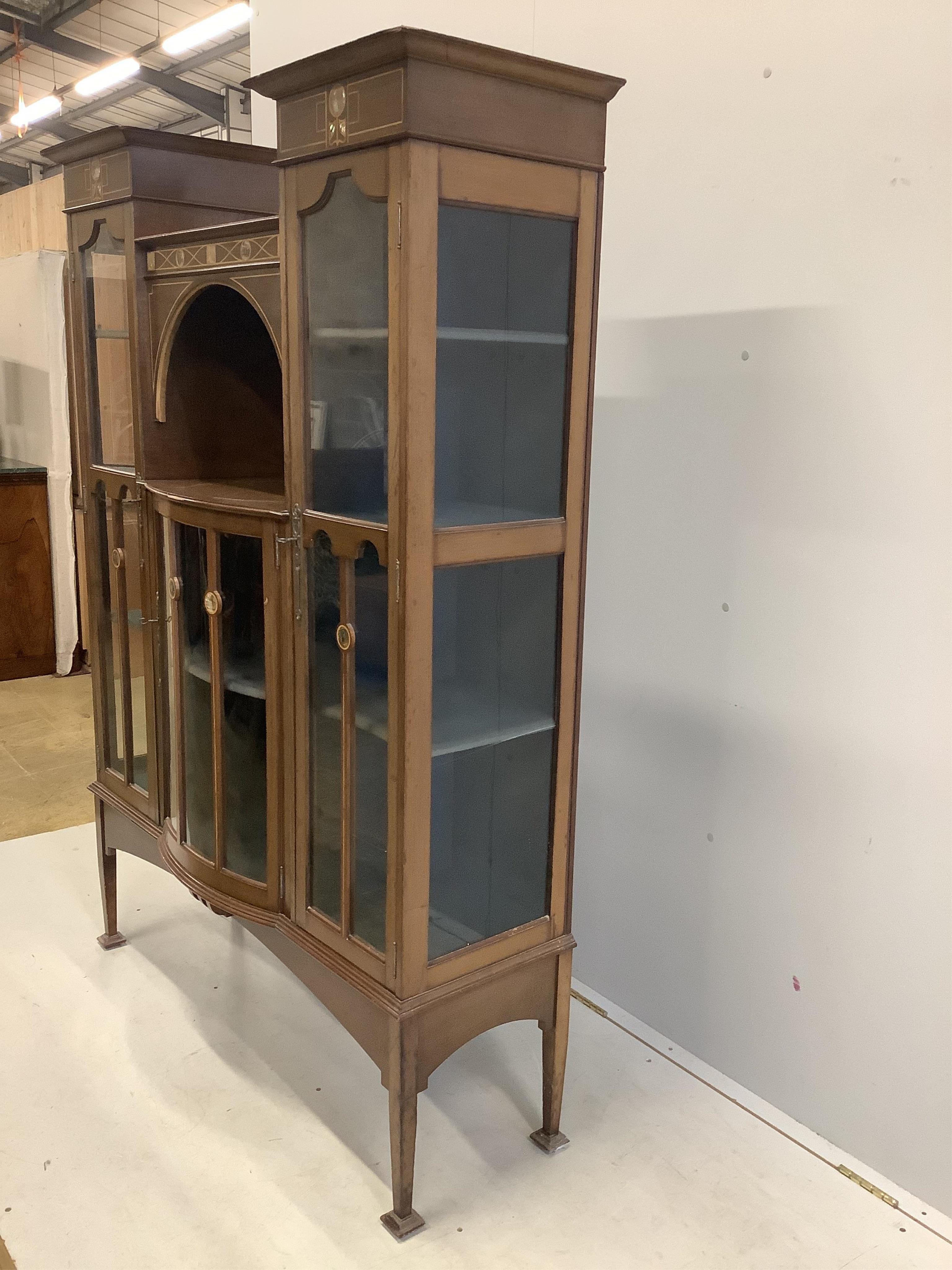 An Edwardian Art Nouveau mother of pearl inlaid display cabinet, width 122cm, depth 38cm, height 169cm. Condition - fair